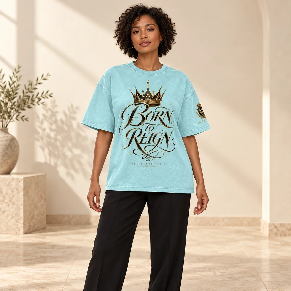 BELVEDERE NOIRE Aqua Born to Reign T-shirt, studio front view, AI product mockup