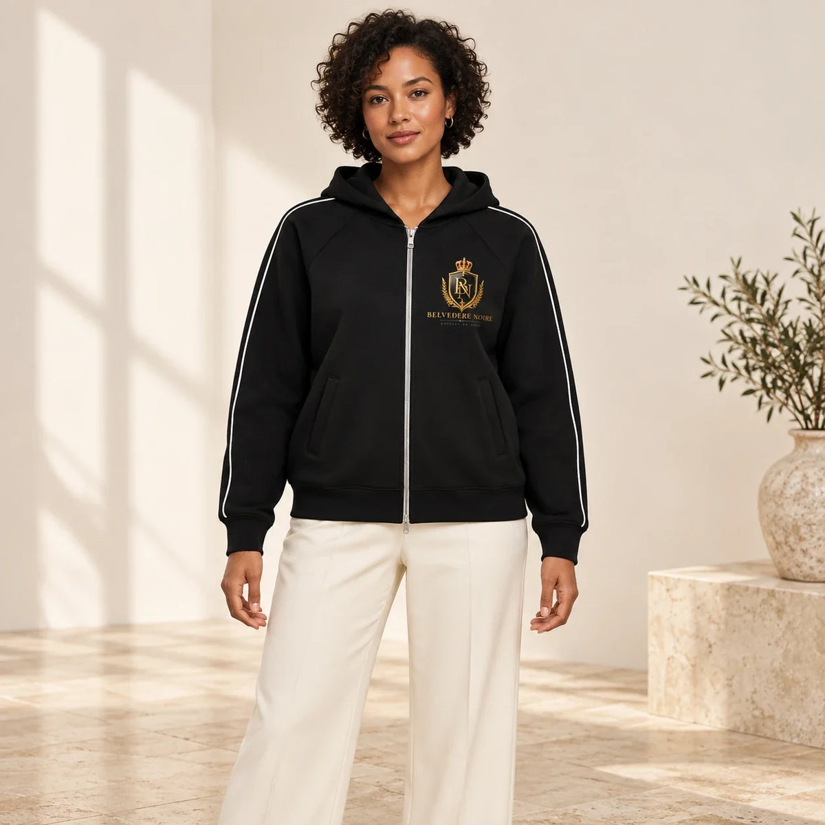 BELVEDERE NOIRE Black piped zip hoodie, studio front view, AI product mockup