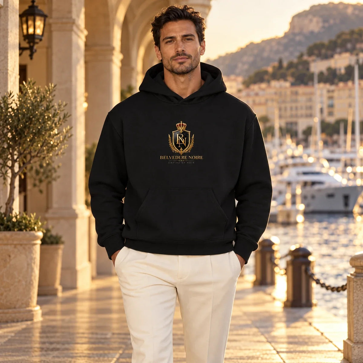 BELVEDERE NOIRE Black centre-crest hoodie, marina front view, AI product mockup