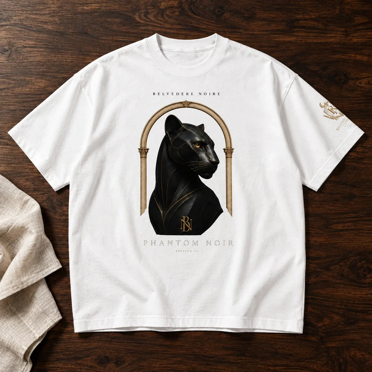 White Boxy Oversized T-Shirt flat lay on walnut