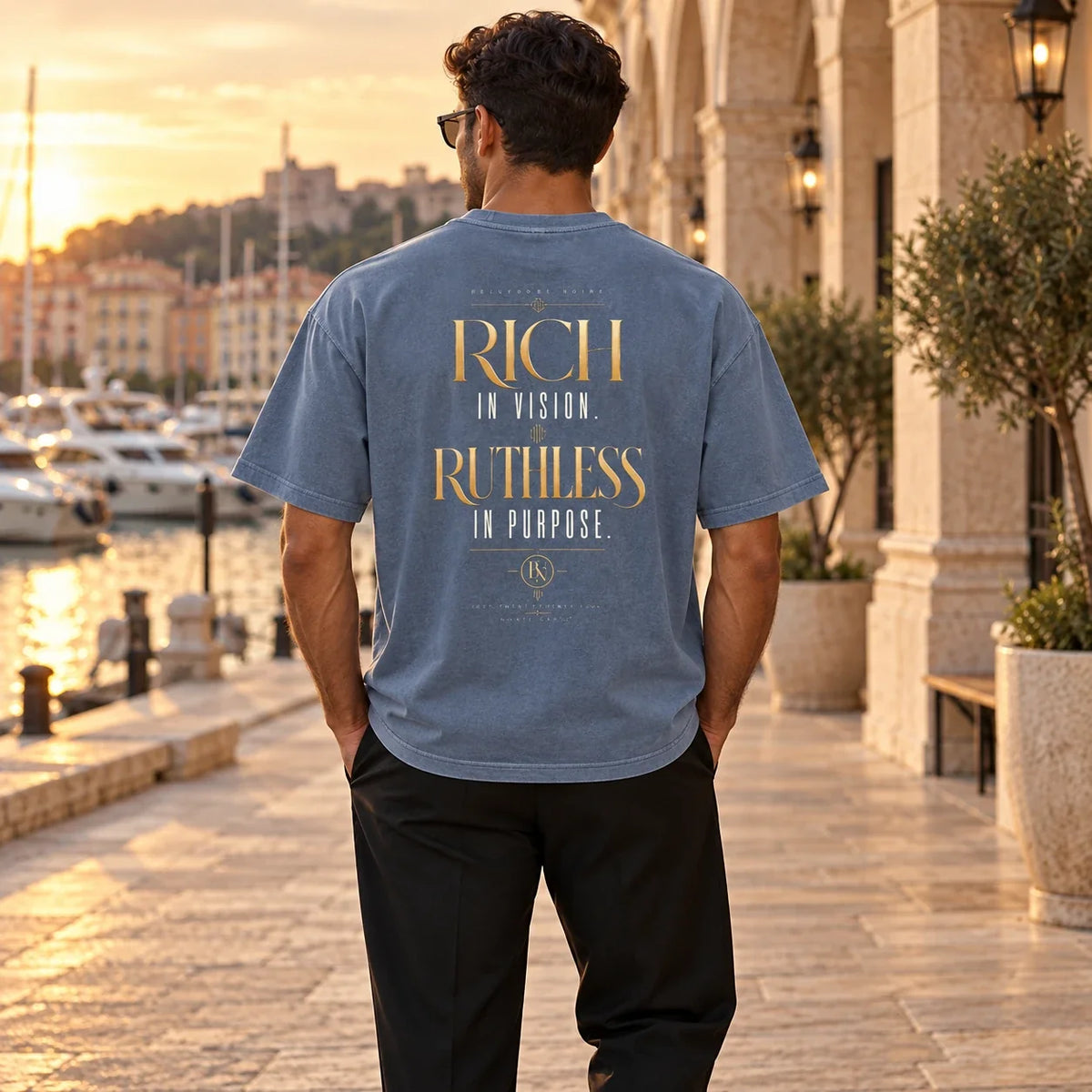 Slate Enzyme Washed Oversized T-Shirt worn at the marina, rear view