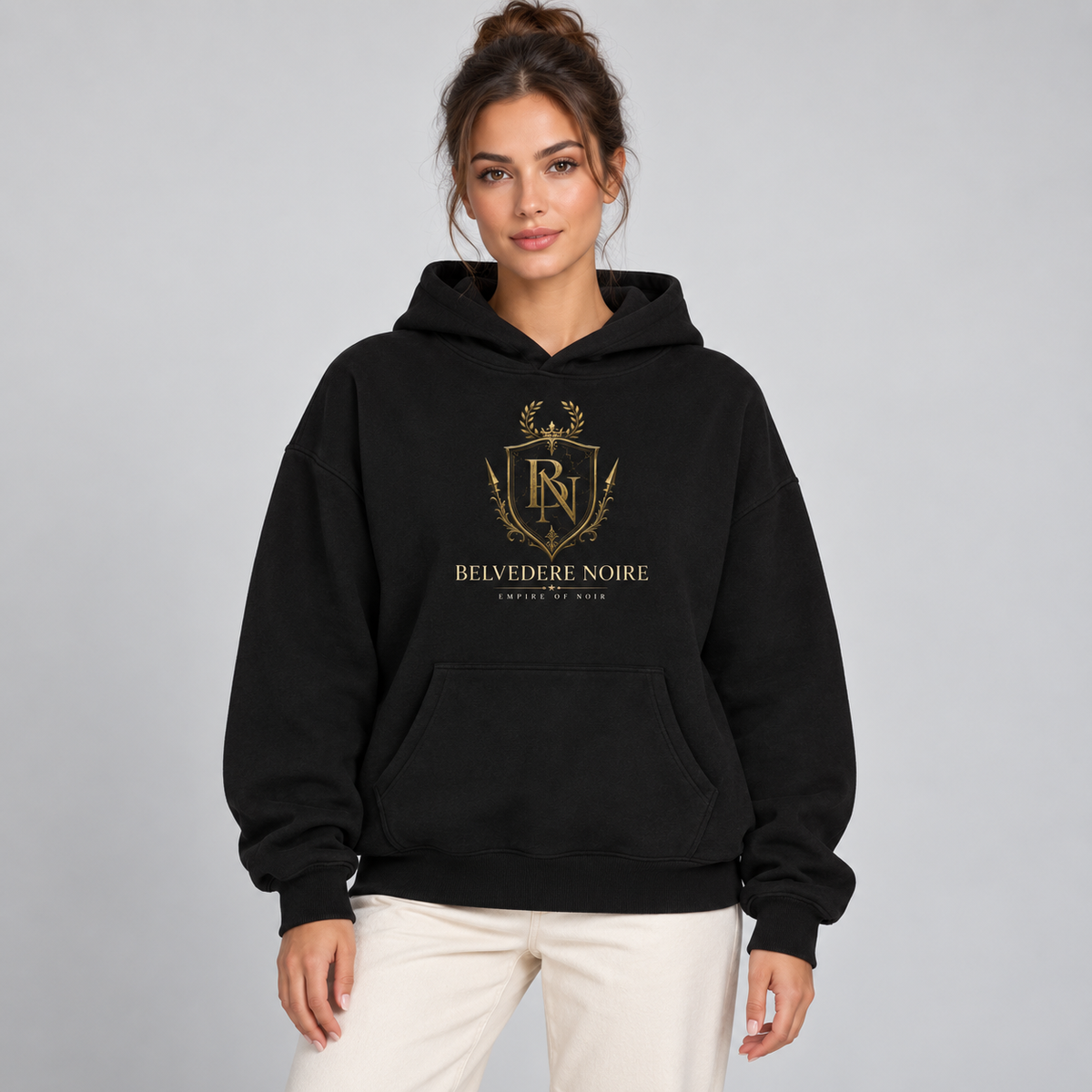 Model wearing the black Oversize Fleeced Hoodie with Empire of Noir crest