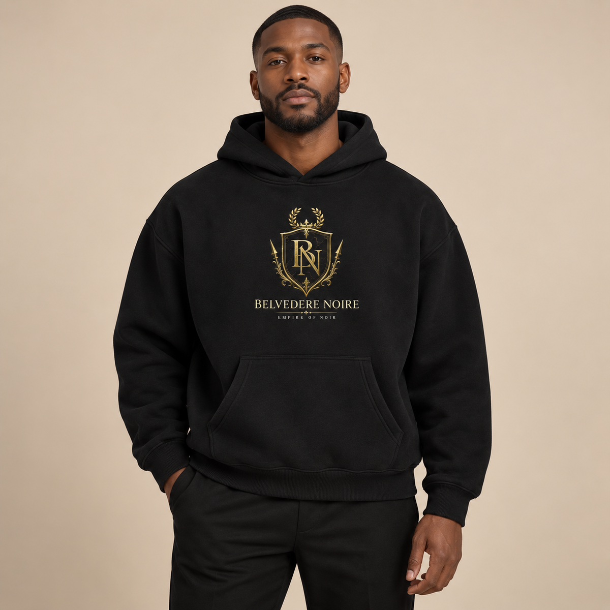 Model wearing the black Oversize Fleeced Hoodie with Empire of Noir crest, front view