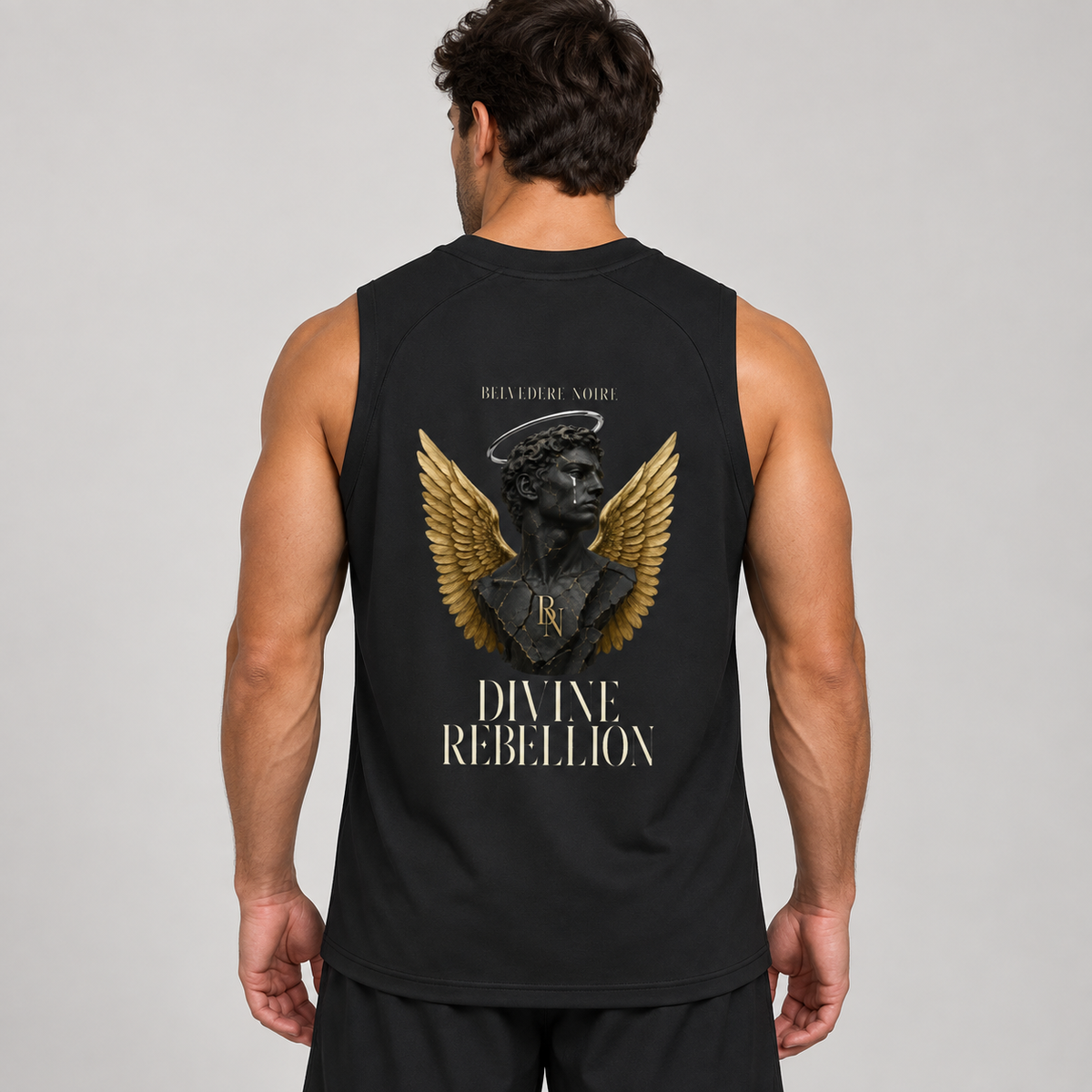 AI styling mockup: male back view in black Divine Rebellion performance tank top