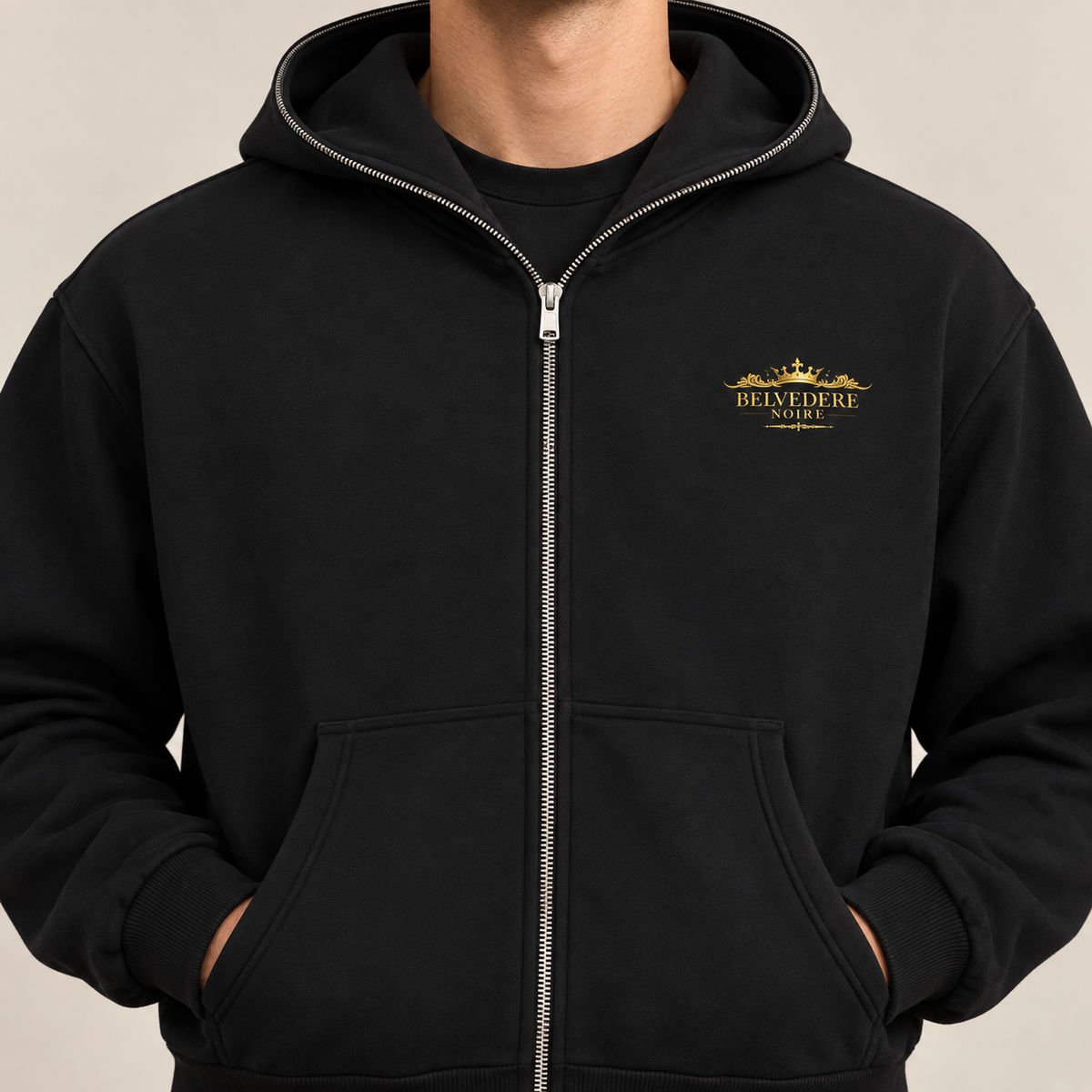 Detail of the gold chest print and zip on the Fleeced Full-Zip Boxy Hoodie