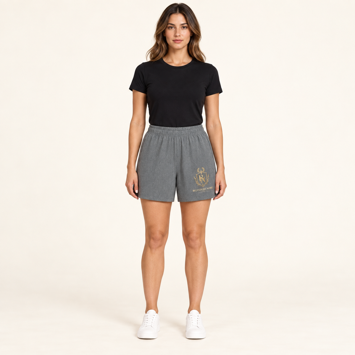Model wearing the grey Loose Fit Elastic Waist Shorts, front view
