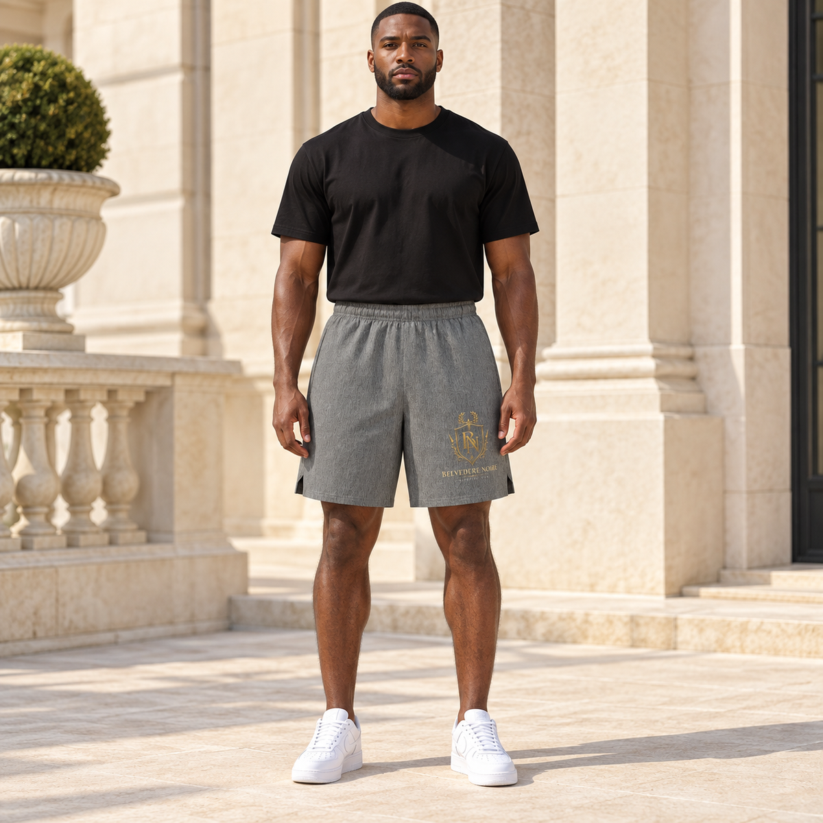 Model wearing the grey Loose Fit Elastic Waist Shorts outdoors
