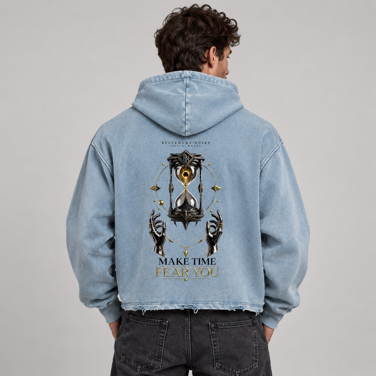 AI styling mockup: male back view in blue Make Time Fear You hoodie