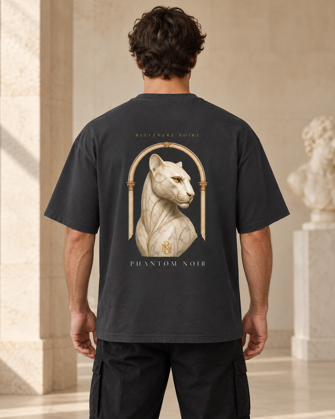 Model wearing the black Classic Loose Boxy Tee, back view