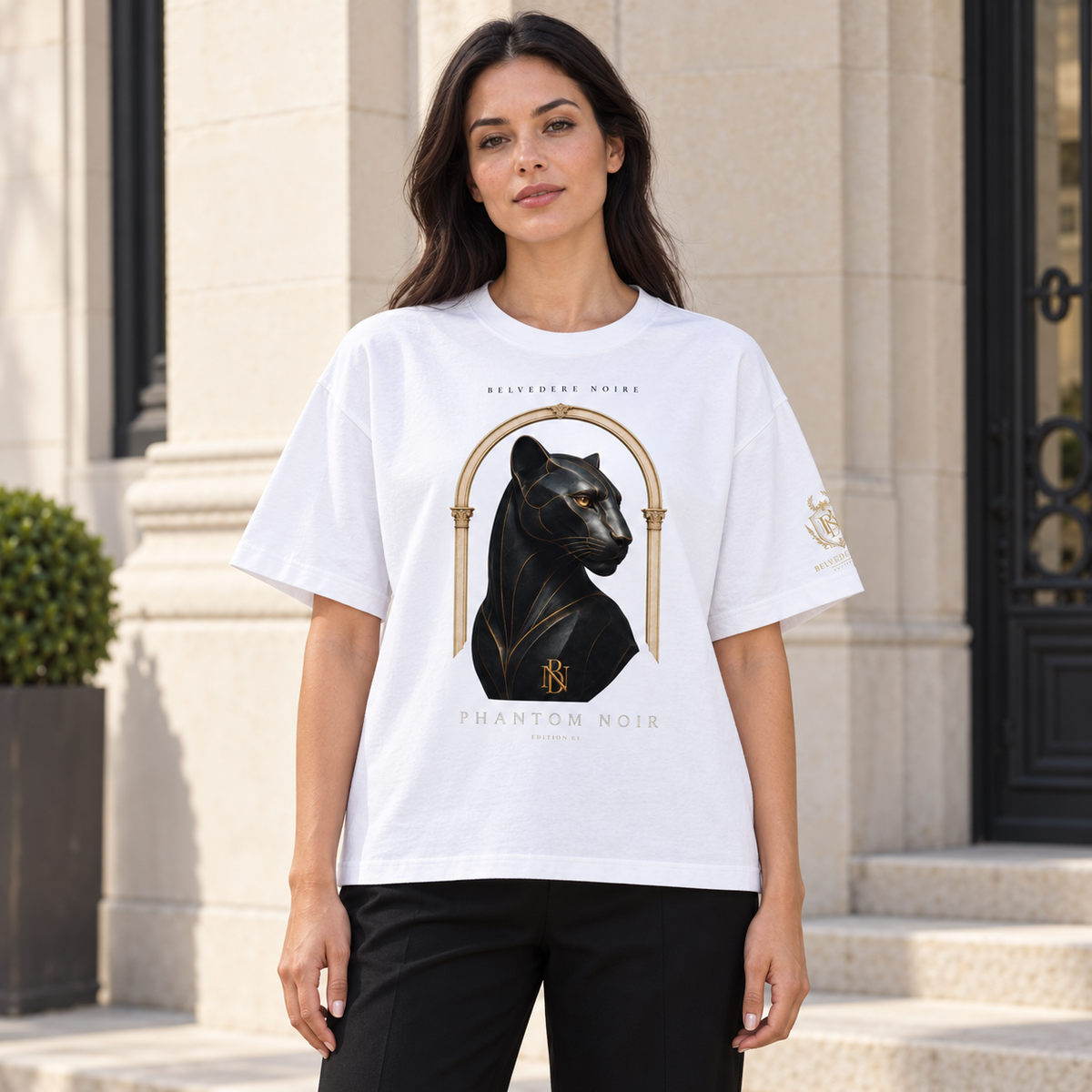 Model wearing the white Boxy Oversized T-Shirt outdoors