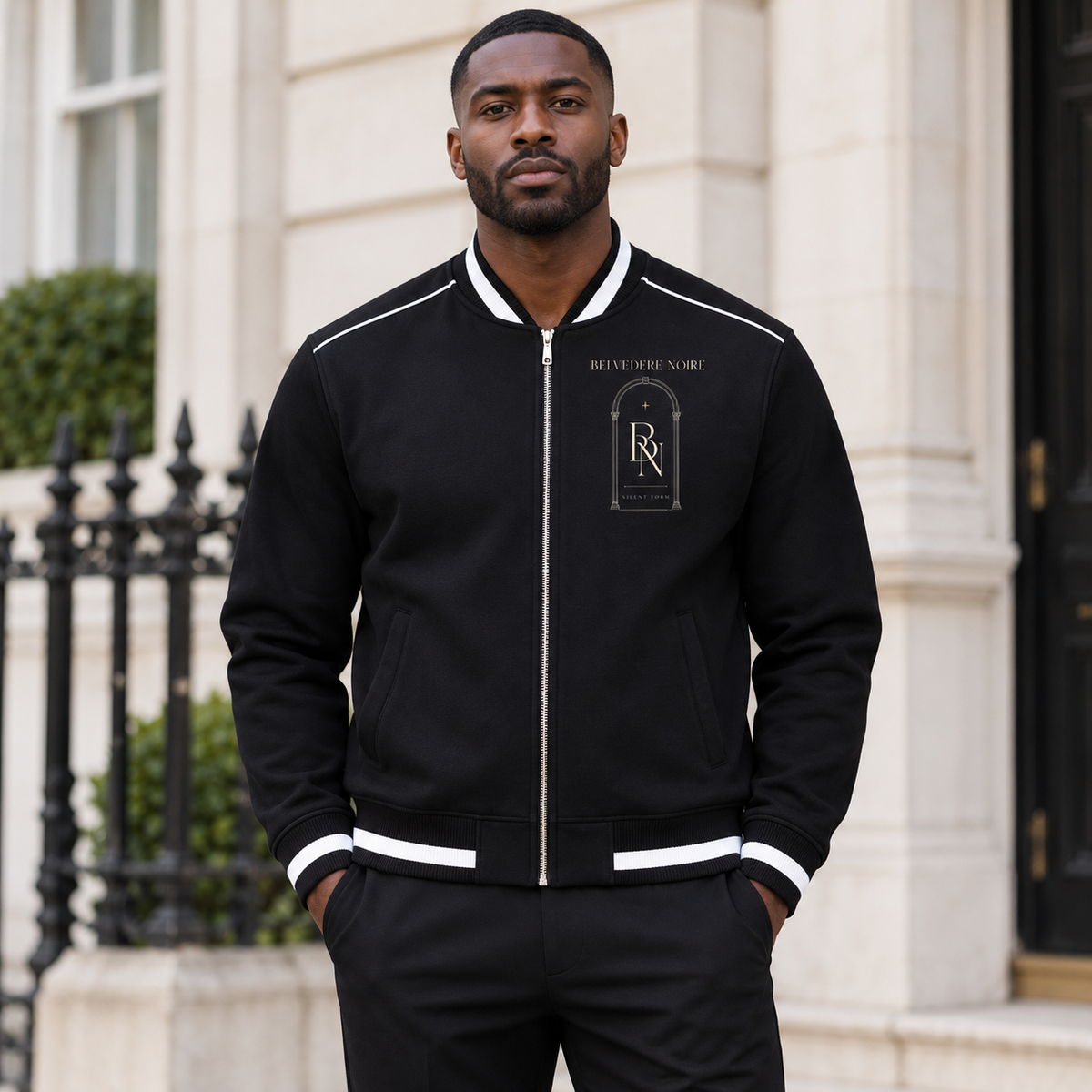 Model wearing the black Contrast Piping Zip Bomber Jacket outdoors