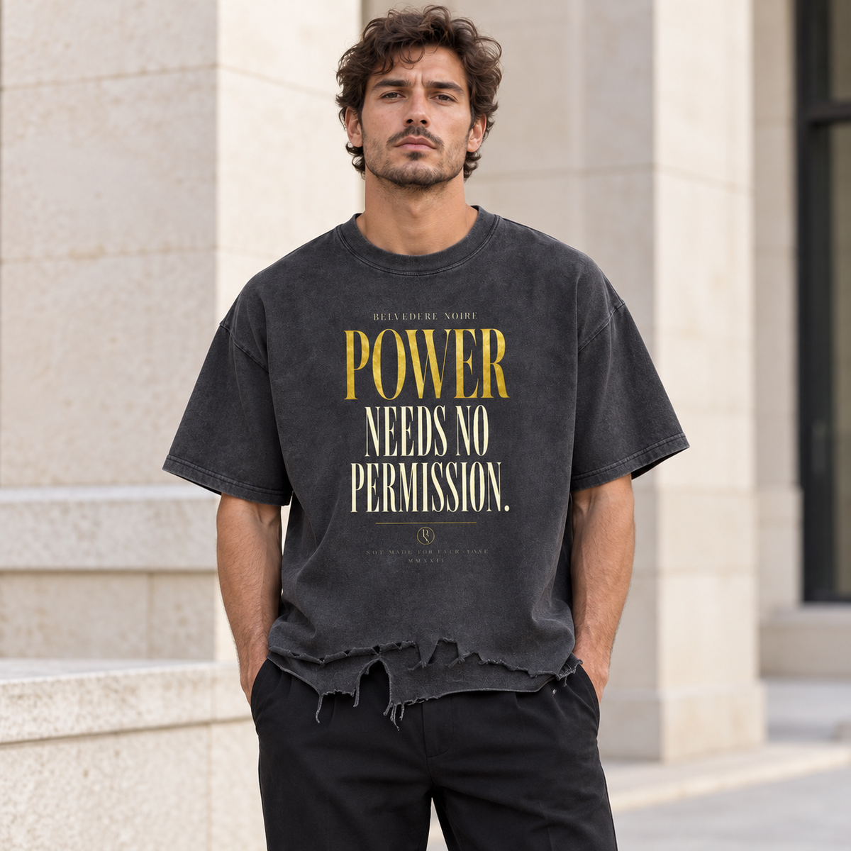 Model wearing the charcoal Vintage Wash Distressed Hem T-Shirt outdoors