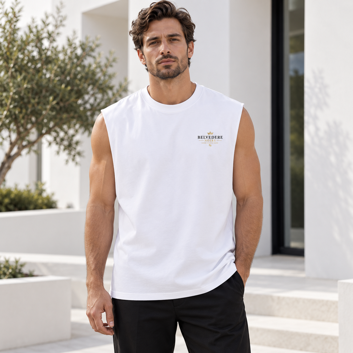 Model wearing the white Raw Edge Cotton Tank Top outdoors