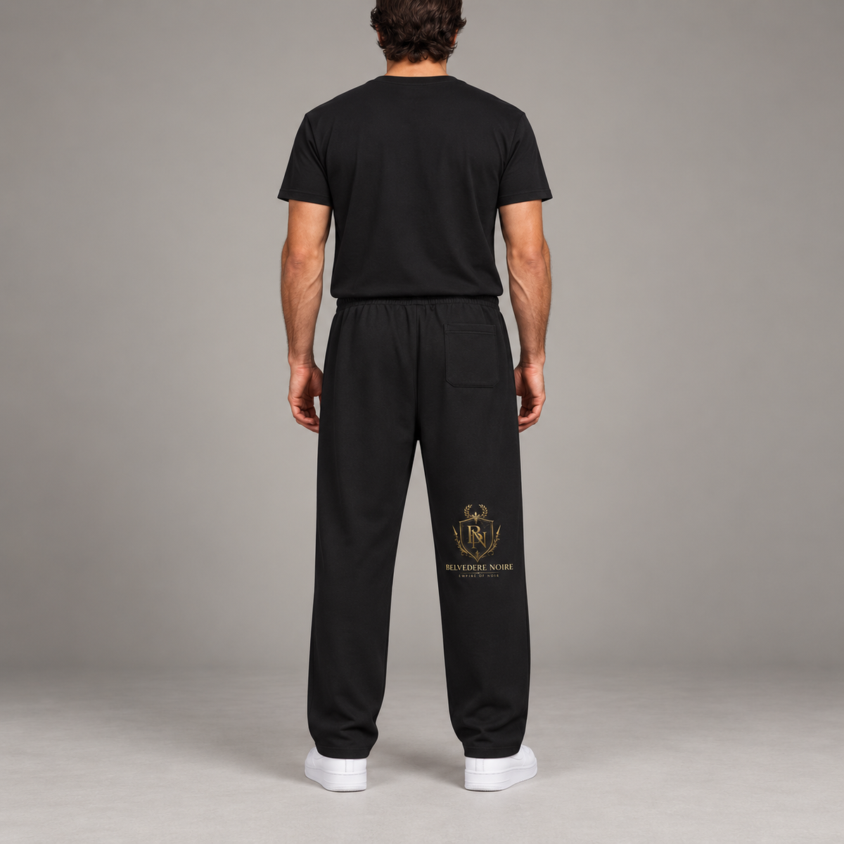 Model wearing the Reflection Striped Straight-Leg Sweatpants, back view