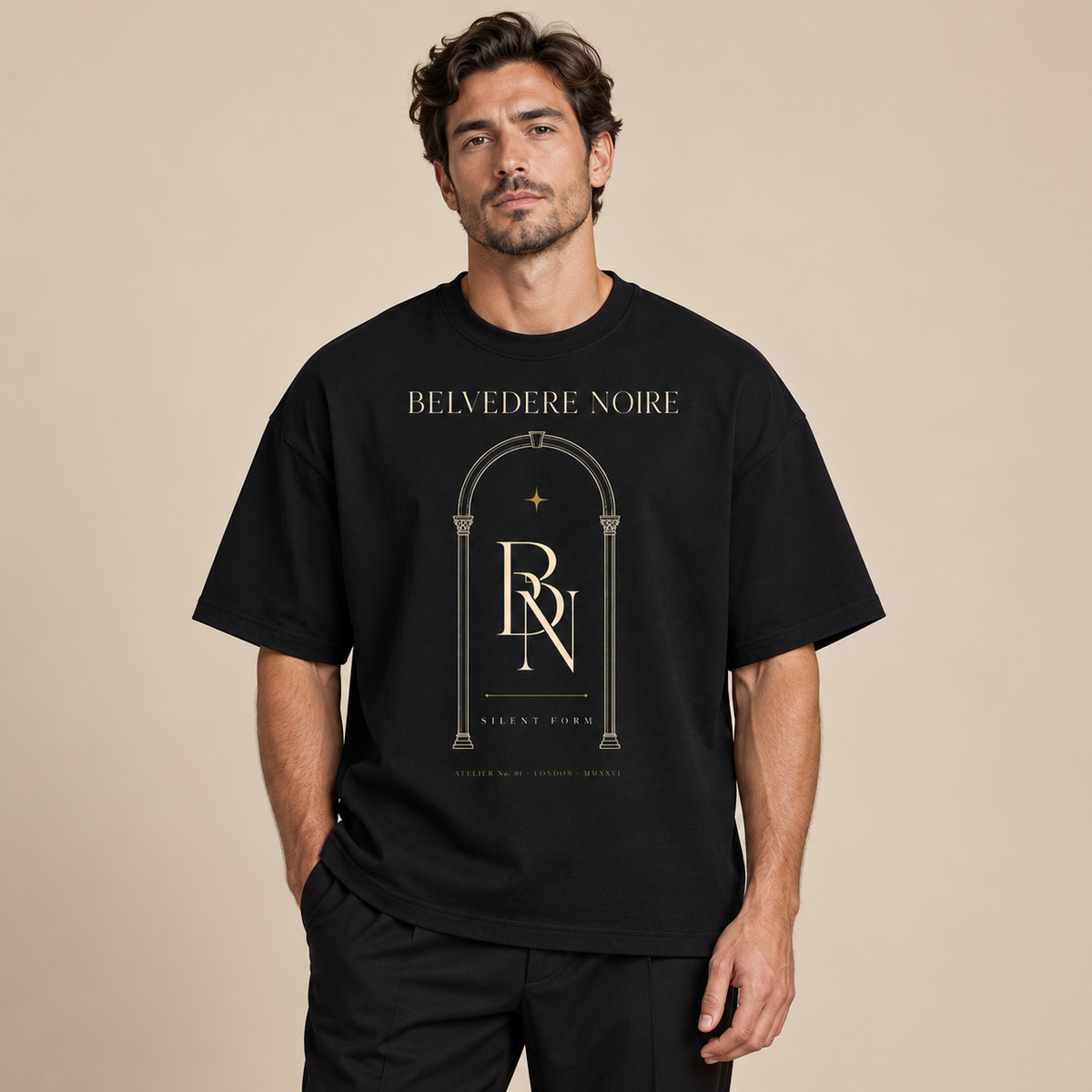 Model wearing the black Silent Form oversized drop shoulder T-shirt, front view