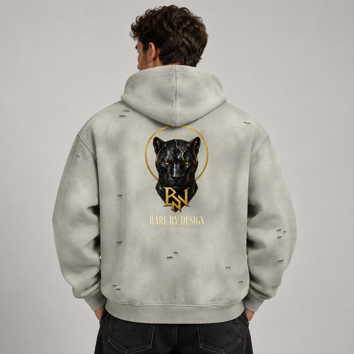 AI styling mockup: male back view in Rare By Design light grey hoodie