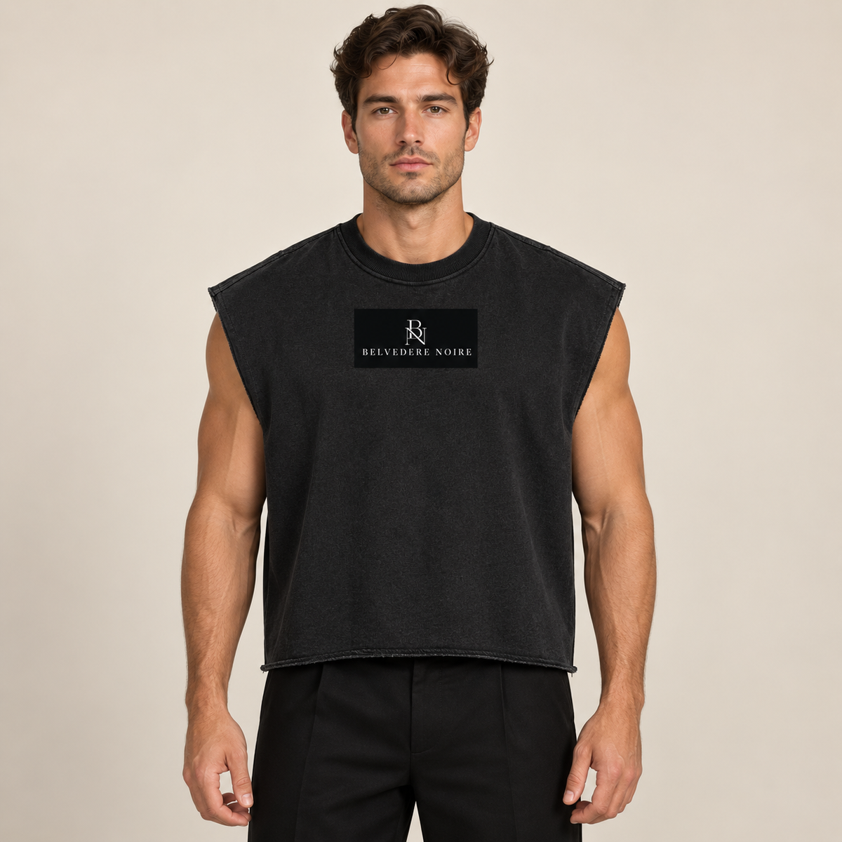 Model wearing the black French Terry Boxy Tank Top, studio front view